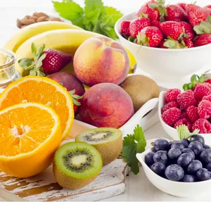 Fresh mixed fruits, honey and berries. Healthy eating. Selective focus